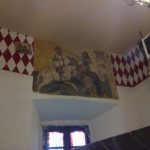Dipinto anticato su muro "Battaglia medievale"